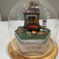 "Farm Stand" by Laura Johnson. This was created in a workshop at the NAME Sacramento houseparty. Laura is a member of the Mini Attics.